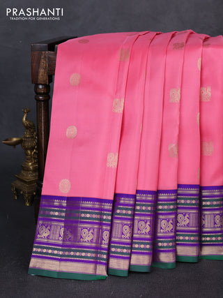Pure kanchipuram silk saree light pink and violet with annam & rudhraksha zari woven buttas and zari woven peacock design border