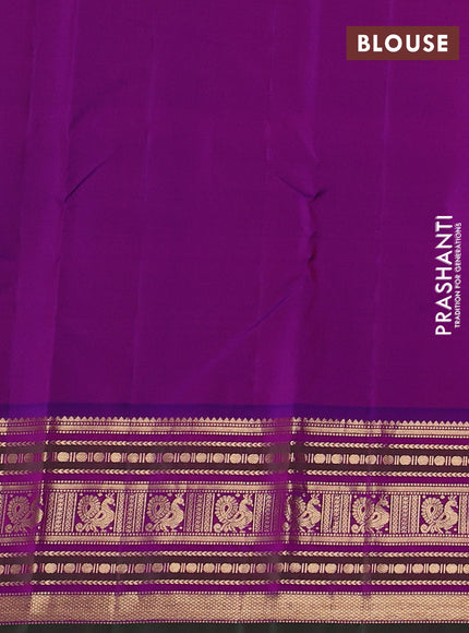 Pure kanchipuram silk saree pista green and purple with annam & rudhraksha zari woven buttas and zari woven peacock design border