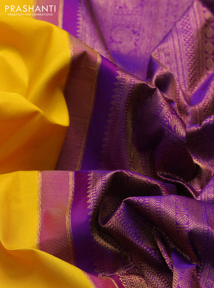 Pure kanchipuram silk saree mango yellow and purple with annam & rudhraksha zari woven buttas and zari woven peacock design border