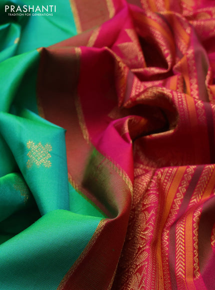 Pure kanchipuram silk saree teal green and pink with zari woven buttas and long zari woven peacock design border