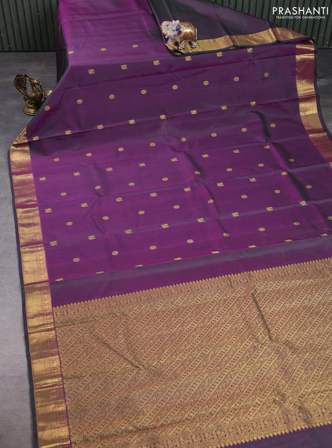 Pure kanchipuram silk saree dual shade of pinkish green with allover zari woven buttas and zari woven korvai border