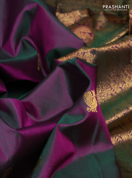 Pure kanchipuram silk saree dual shade of pinkish green with allover zari woven buttas and zari woven korvai border