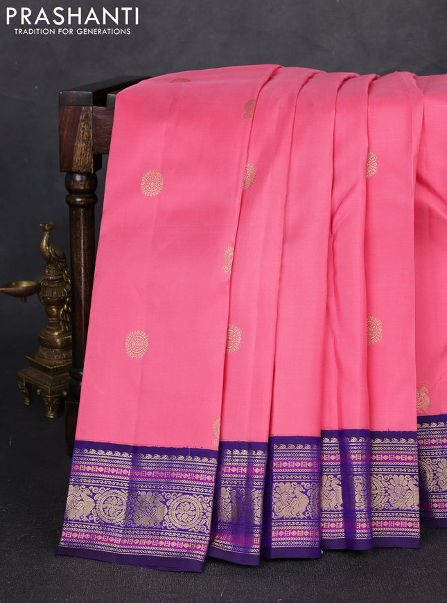 Pure kanchipuram silk saree peach pink and violet with zari woven buttas and zari woven korvai border