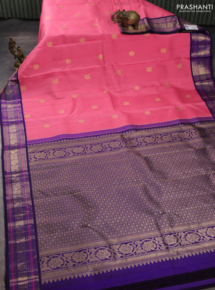 Pure kanchipuram silk saree peach pink and violet with zari woven buttas and zari woven korvai border