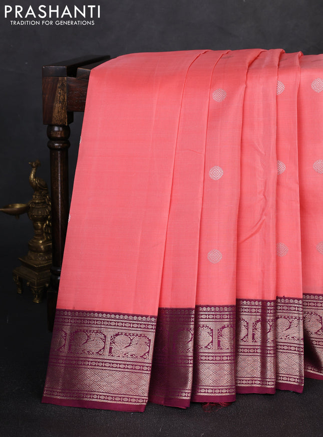 Pure kanchipuram silk saree peach pink and wine shade with zari woven buttas and zari woven korvai border