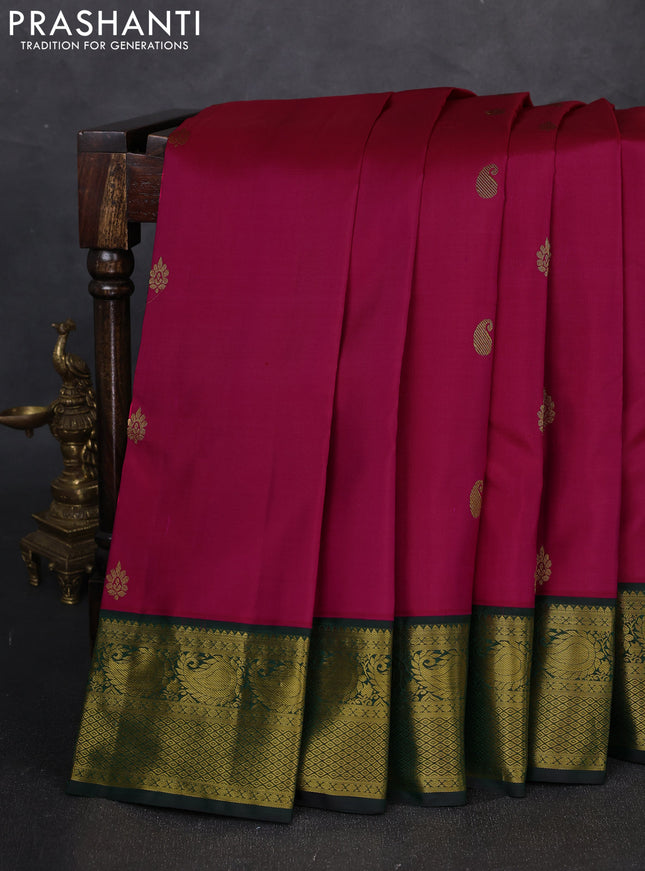 Pure kanchipuram silk saree pink and bottle green with zari woven buttas and zari woven korvai border