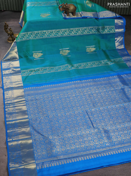 Pure kanchipuram silk saree dual shade of bluish green and cs blue with silver & zari woven buttas and long rich zari woven border