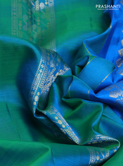 Pure kanchipuram silk saree dual shade of bluish green and cs blue with silver & zari woven buttas and long rich zari woven border