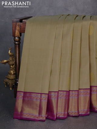 Pure kanchipuram silk saree pista green and pink with rudraksha zari woven buttas and zari woven korvai border