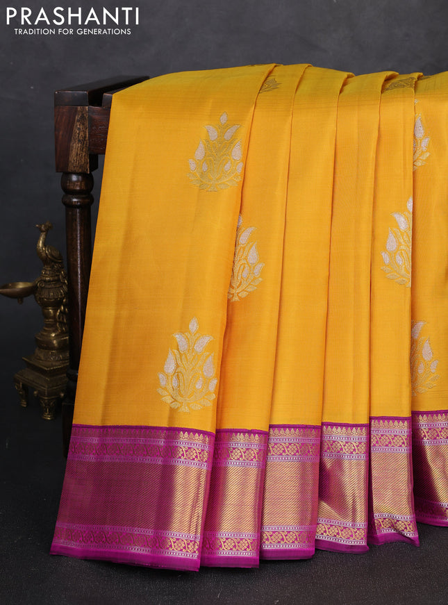Pure kanchipuram silk saree mustard yellow and pink with zari woven buttas and zari woven korvai border