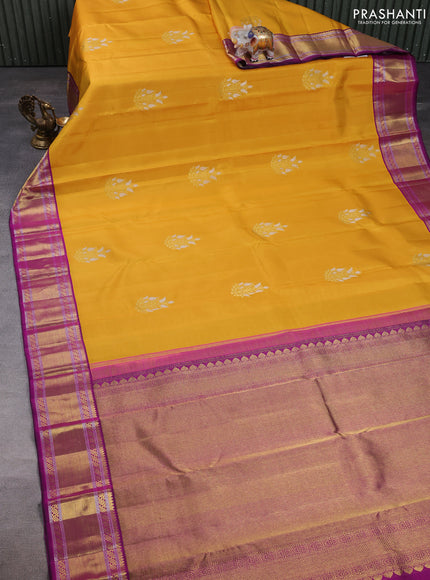 Pure kanchipuram silk saree mustard yellow and pink with zari woven buttas and zari woven korvai border