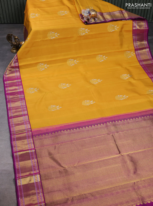 Pure kanchipuram silk saree mustard yellow and pink with zari woven buttas and zari woven korvai border