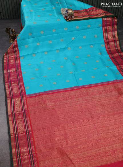 Pure kanchipuram silk saree teal blue and green with zari woven buttas and zari woven korvai border
