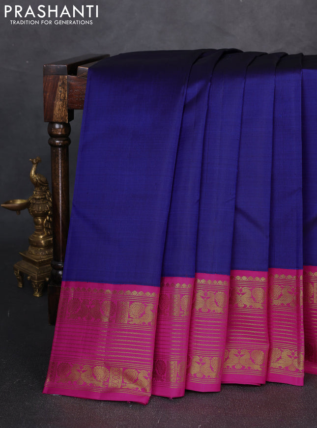 Pure kanchipuram silk saree royal blue and pink with plain body and zari woven korvai border