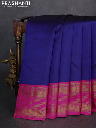 Pure kanchipuram silk saree royal blue and pink with plain body and zari woven korvai border