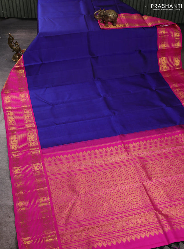 Pure kanchipuram silk saree royal blue and pink with plain body and zari woven korvai border