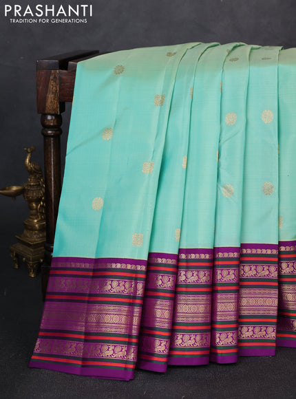 Pure kanchipuram silk saree teal green and purple with zari woven buttas and long thread & zari woven buttas