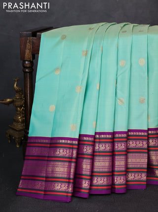 Pure kanchipuram silk saree teal green and purple with zari woven buttas and long thread & zari woven buttas