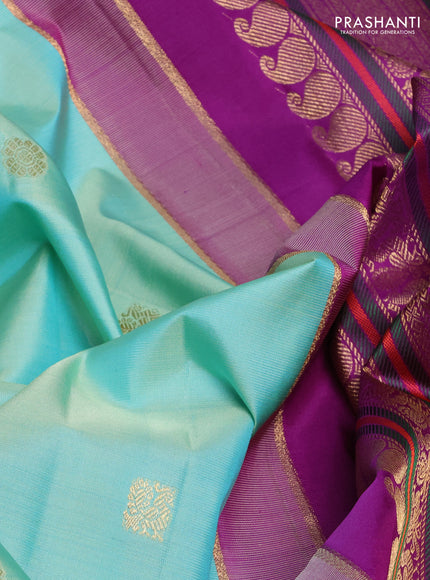 Pure kanchipuram silk saree teal green and purple with zari woven buttas and long thread & zari woven buttas