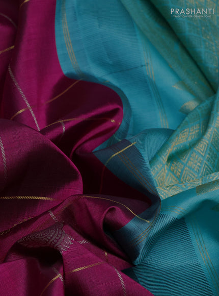 Pure kanchipuram silk saree purple and teal green with allover zari woven ckecks & buttas and long zari woven border
