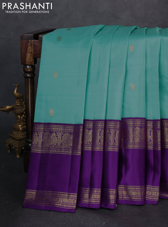 Pure kanchipuram silk saree teal blue and purple with zari woven buttas and rettapet zari woven border