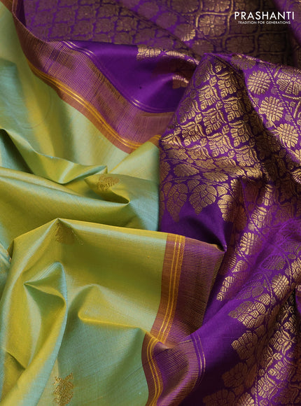 Pure kanchipuram silk saree dual shade teal green and purple with zari woven buttas and rettapet zari woven border