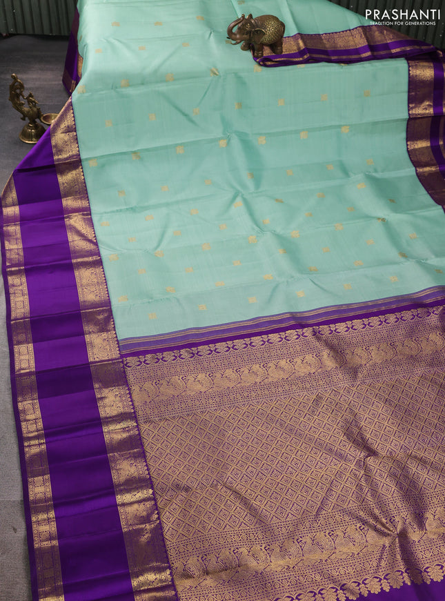 Pure kanchipuram silk saree teal green and violet with zari woven buttas and rettapet zari woven border