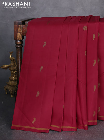 Pure kanchipuram silk saree maroon and yellow with allover zari woven buttas and small zari woven border
