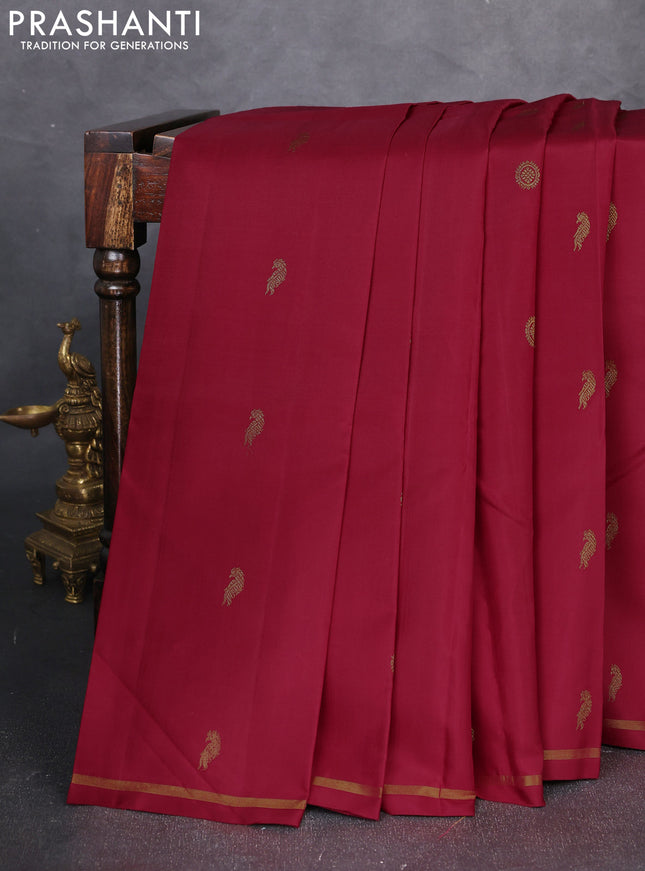 Pure kanchipuram silk saree maroon and yellow with allover zari woven buttas and small zari woven border