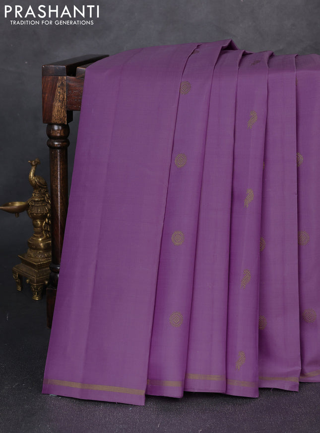 Pure kanchipuram silk saree lavender with allover zari woven buttas and small zari woven border