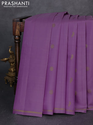 Pure kanchipuram silk saree lavender with allover zari woven buttas and small zari woven border