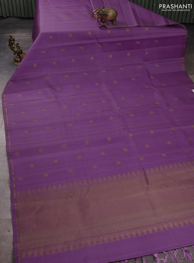 Pure kanchipuram silk saree lavender with allover zari woven buttas and small zari woven border