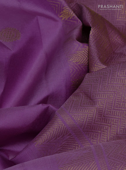 Pure kanchipuram silk saree lavender with allover zari woven buttas and small zari woven border