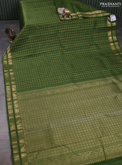 Pure kanchipuram silk saree sap green with allover zari checks & buttas and zari woven border