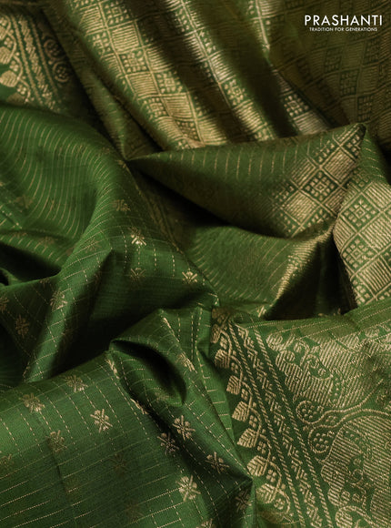 Pure kanchipuram silk saree sap green with allover zari checks & buttas and zari woven border