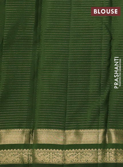Pure kanchipuram silk saree sap green with allover zari checks & buttas and zari woven border