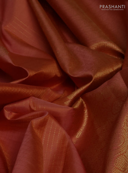 Pure kanchipuram silk saree rust shade with allover zari stripe & buttas and zari woven border