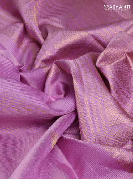 Pure kanchipuram silk saree lotus pink with allover zari vairaosi pattern and zari woven border