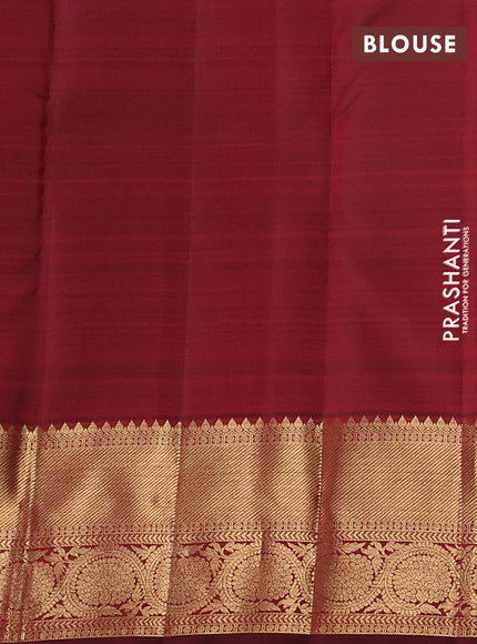Pure kanchipuram silk saree deep maroon with allover zari weaves & buttas and zari woven border