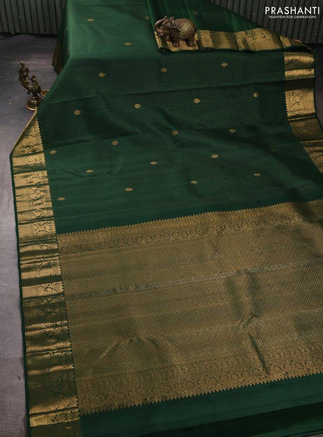 Pure kanchipuram silk saree bottle green with allover zari stripe & buttas and zari woven border