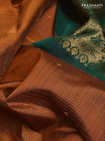 Pure kanchipuram silk saree rust shade and green with allover zari stripe & buttas and zri woven border