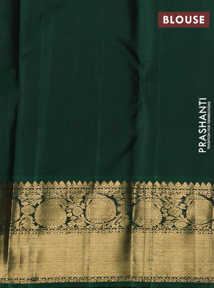Pure kanchipuram silk saree rust shade and green with allover zari stripe & buttas and zri woven border