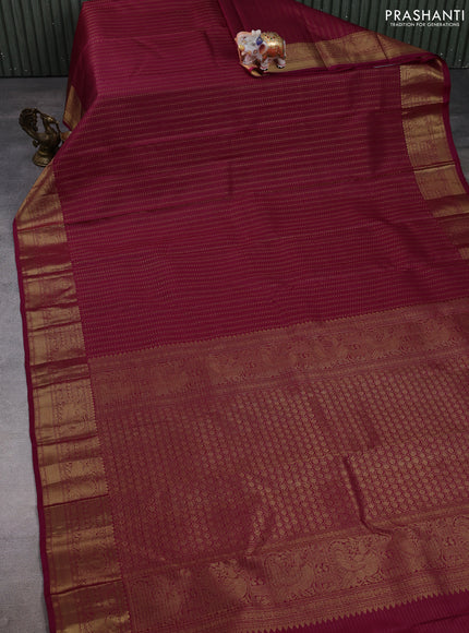 Pure kanchipuram silk saree wine shade with allover small zari checks & buttas and zari woven border