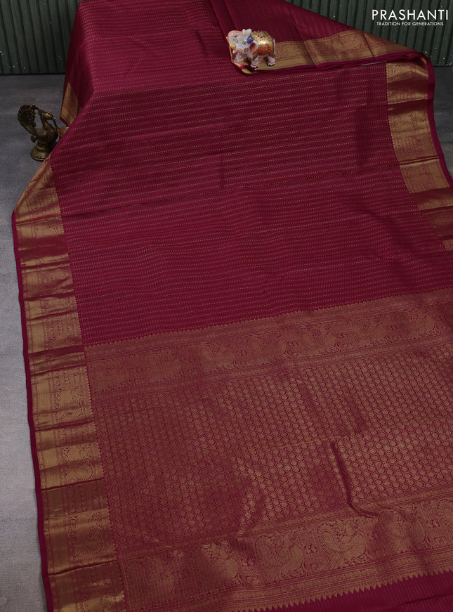 Pure kanchipuram silk saree wine shade with allover small zari checks & buttas and zari woven border