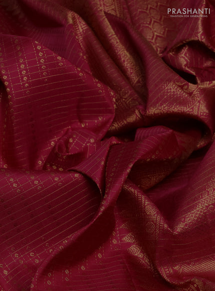Pure kanchipuram silk saree wine shade with allover small zari checks & buttas and zari woven border