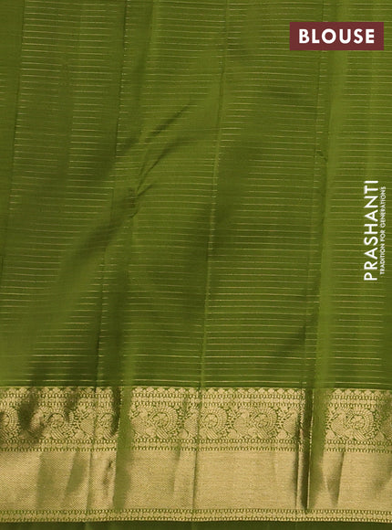 Pure kanchipuram silk saree light green with allover small zari checks & buttas and zari woven border
