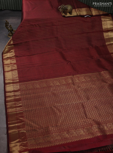 Pure kanchipuram silk saree deep maroon with allover small zari checks & buttas and zari woven border