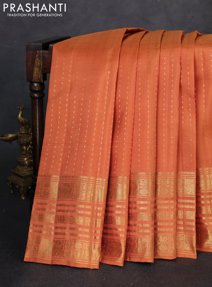 Pure kanchipuram silk saree dark mustard with allover zari woven 1000 buttas and long zari woven border