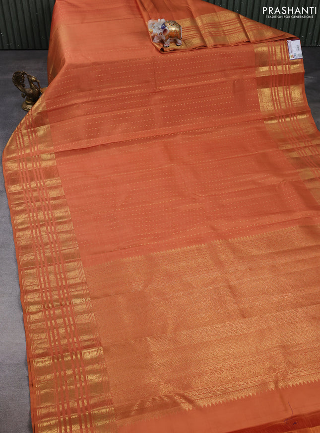 Pure kanchipuram silk saree dark mustard with allover zari woven 1000 buttas and long zari woven border