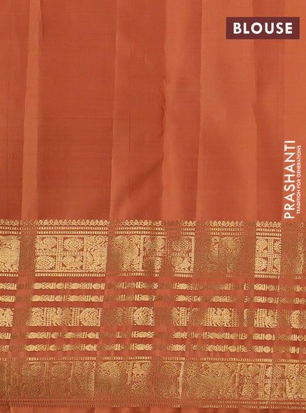 Pure kanchipuram silk saree dark mustard with allover zari woven 1000 buttas and long zari woven border